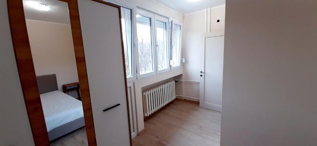 Postel nebo postele na pokoji v ubytování Apartman Studenjak