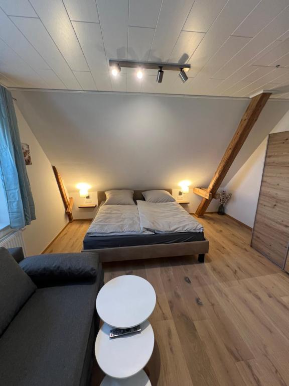 Postel nebo postele na pokoji v ubytování Sonnenschein Appartement- und Ferienhaus mit Terrasse und Garten