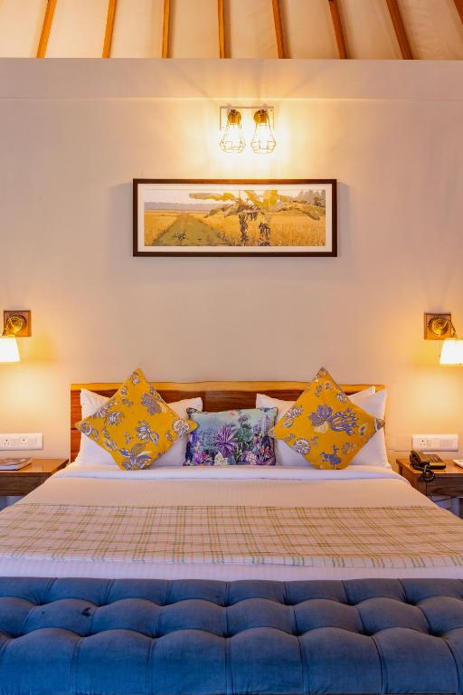 Ένα ή περισσότερα κρεβάτια σε δωμάτιο στο Machaan Wilderness Lodge Nagarahole