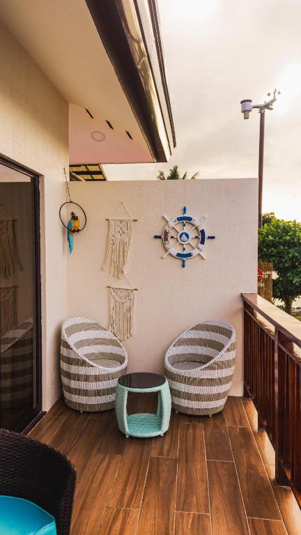 Posezení v ubytování UNWND Boutique Hotel Camiguin