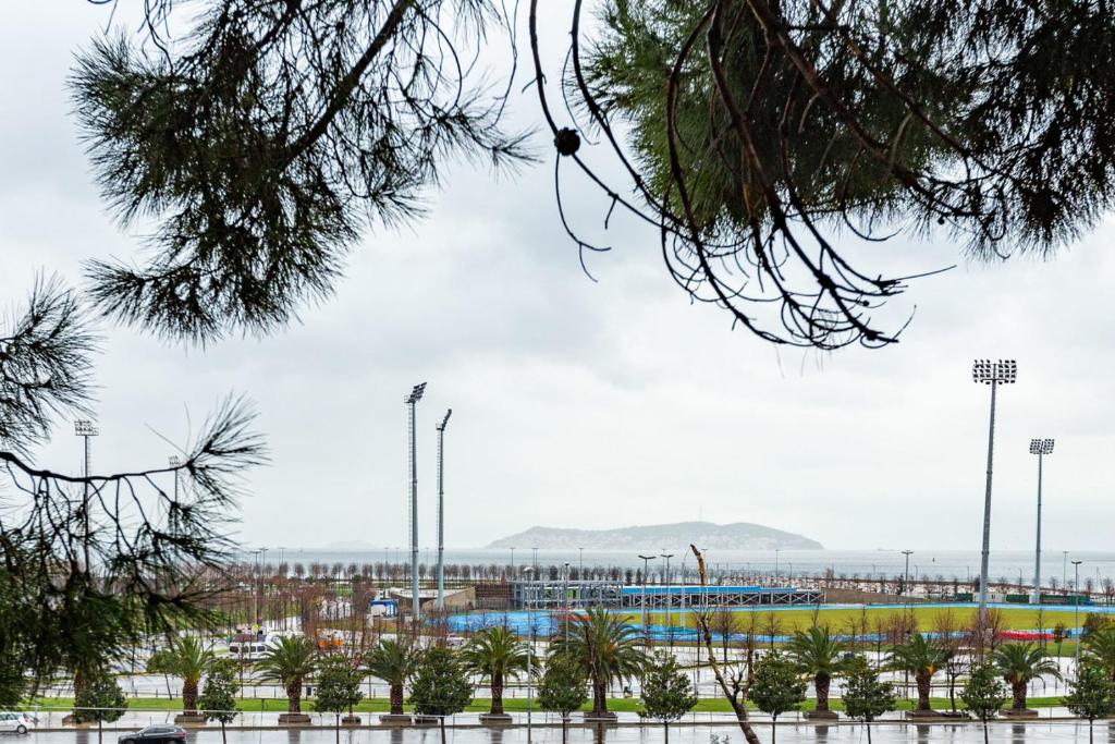 a view of a race track with a stadium at Unique House with Tree Inside near Sea in Maltepe in Istanbul