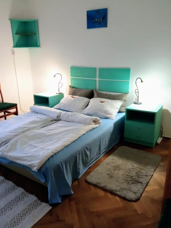 Posteľ alebo postele v izbe v ubytovaní Füsti fecske apartman