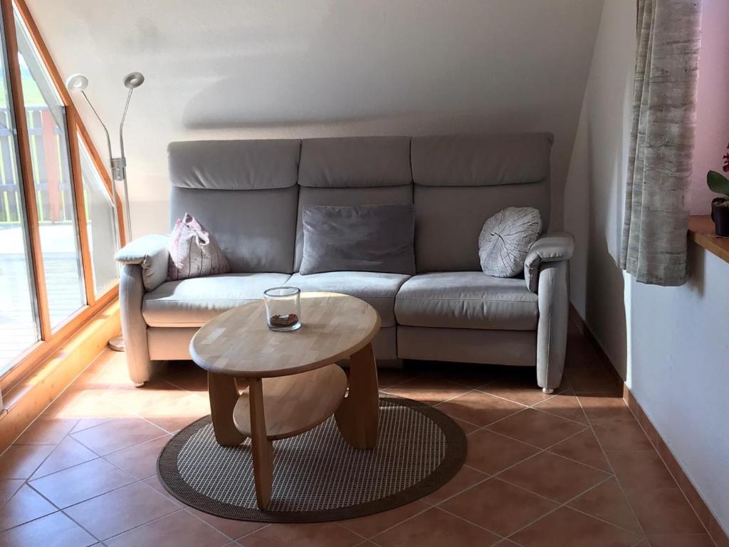 Posezení v ubytování Ferienwohnung Dreimaster W2