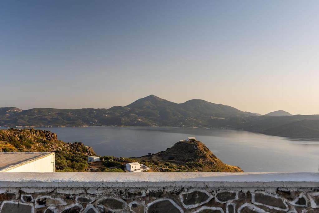 a view of a body of water with mountains at Melisses Sea View Studio in Plaka Milou