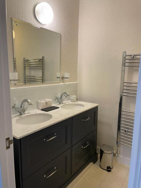 Een badkamer bij The Spinney