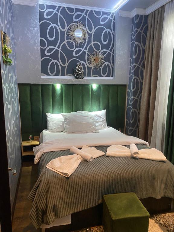 Postel nebo postele na pokoji v ubytování Dea Apartments
