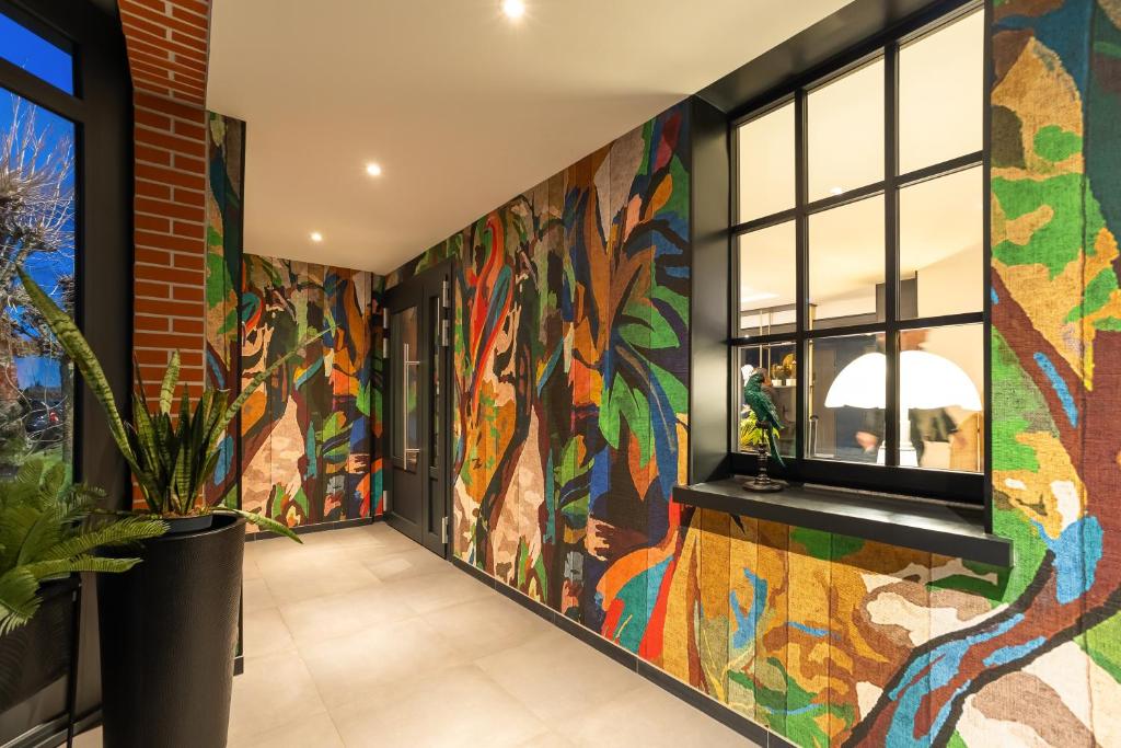 TV a/nebo společenská místnost v ubytování ibis Styles Saint-Quentin
