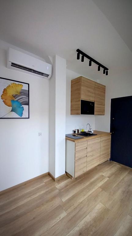 Kuchyň nebo kuchyňský kout v ubytování MH Apartments Towarnickiego