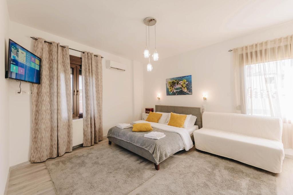 Postel nebo postele na pokoji v ubytování Sunrise Guesthouse