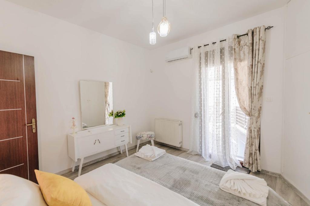 Postel nebo postele na pokoji v ubytování Sunrise Guesthouse
