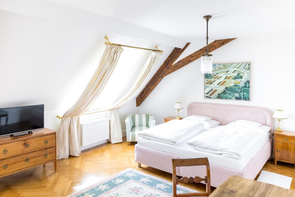 Letto o letti in una camera di Schlossberghotel