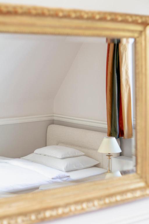 Letto o letti in una camera di Schlossberghotel