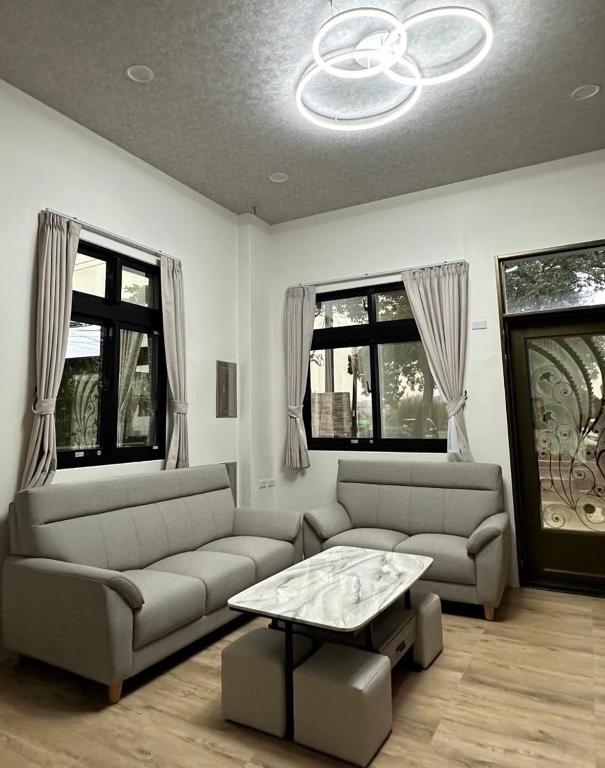 Posezení v ubytování Fulong City B&B