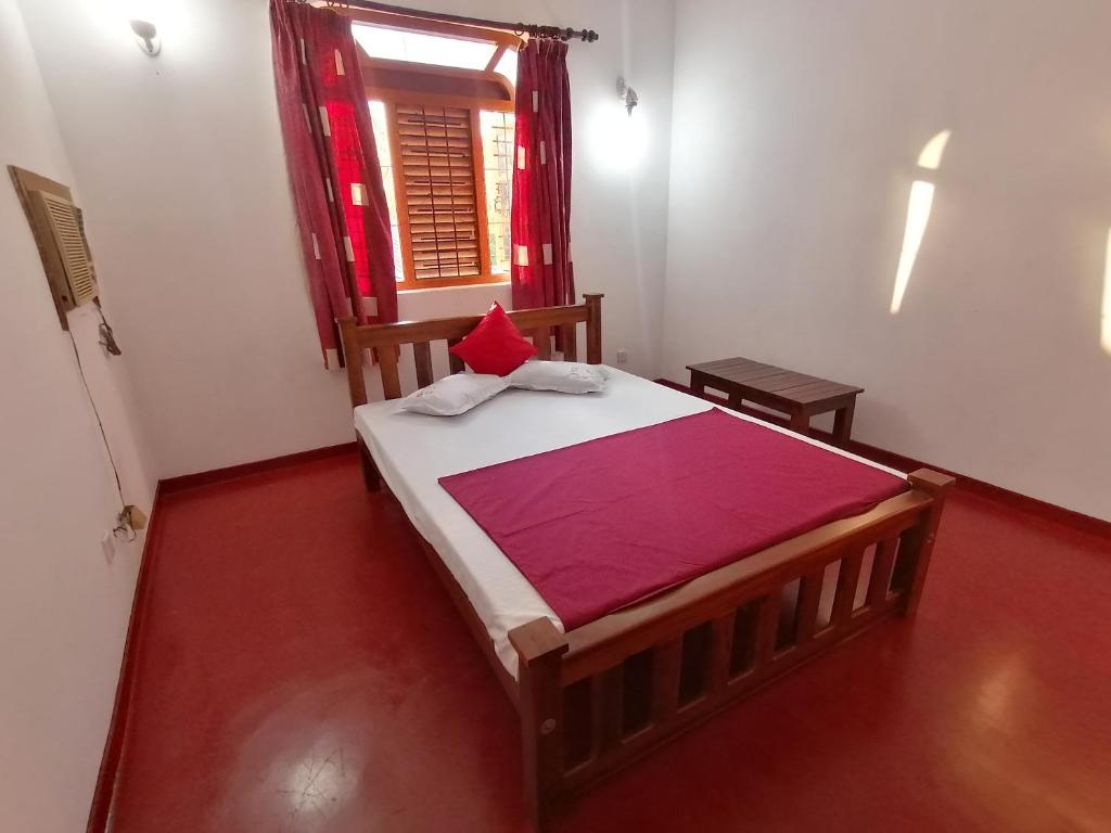 Postel nebo postele na pokoji v ubytování Sunshine Guest House