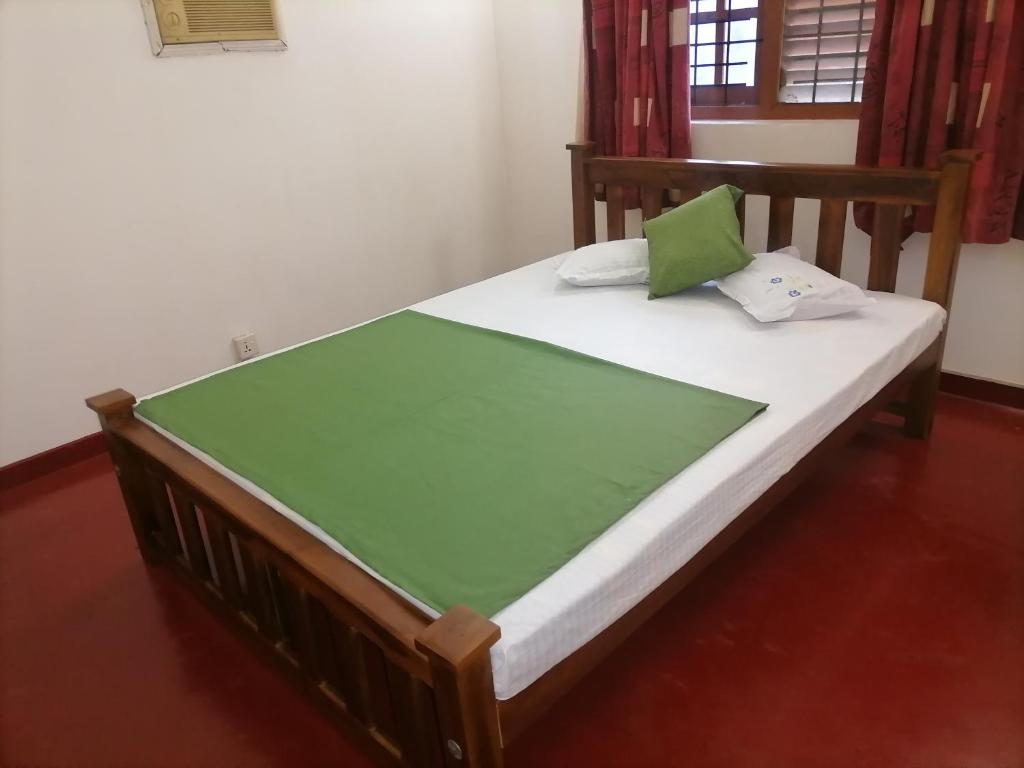 Postel nebo postele na pokoji v ubytování Sunshine Guest House