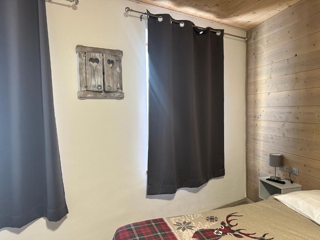 Postel nebo postele na pokoji v ubytování B&B Piazza