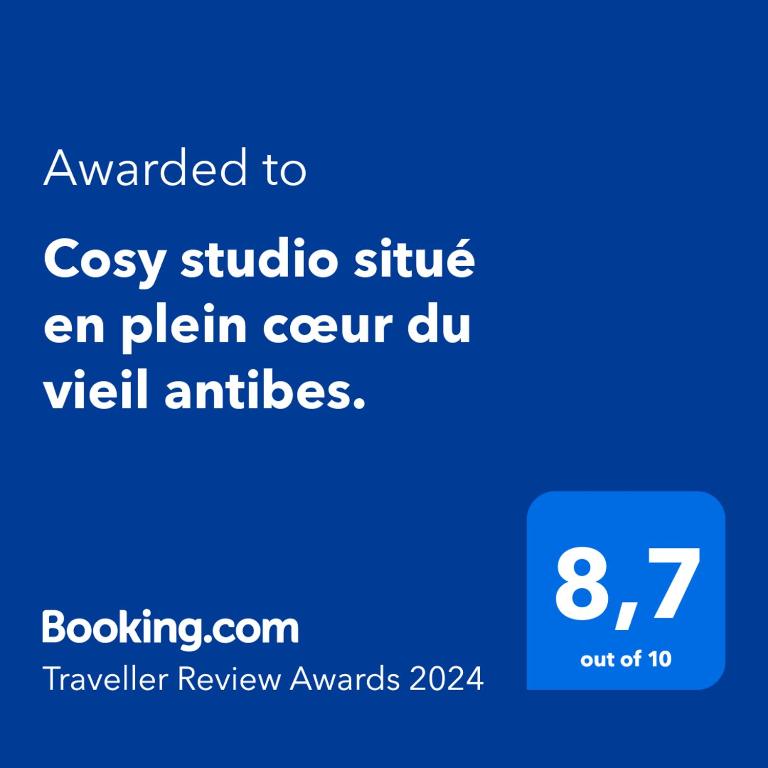 a screenshot of a cell phone with the text awarded to cosy studio site open at Cosy studio situé en plein cœur du vieil antibes. in Antibes