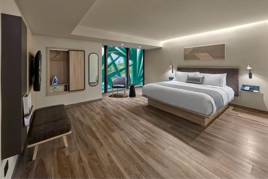 Postel nebo postele na pokoji v ubytování City Express Plus by Marriott Merida
