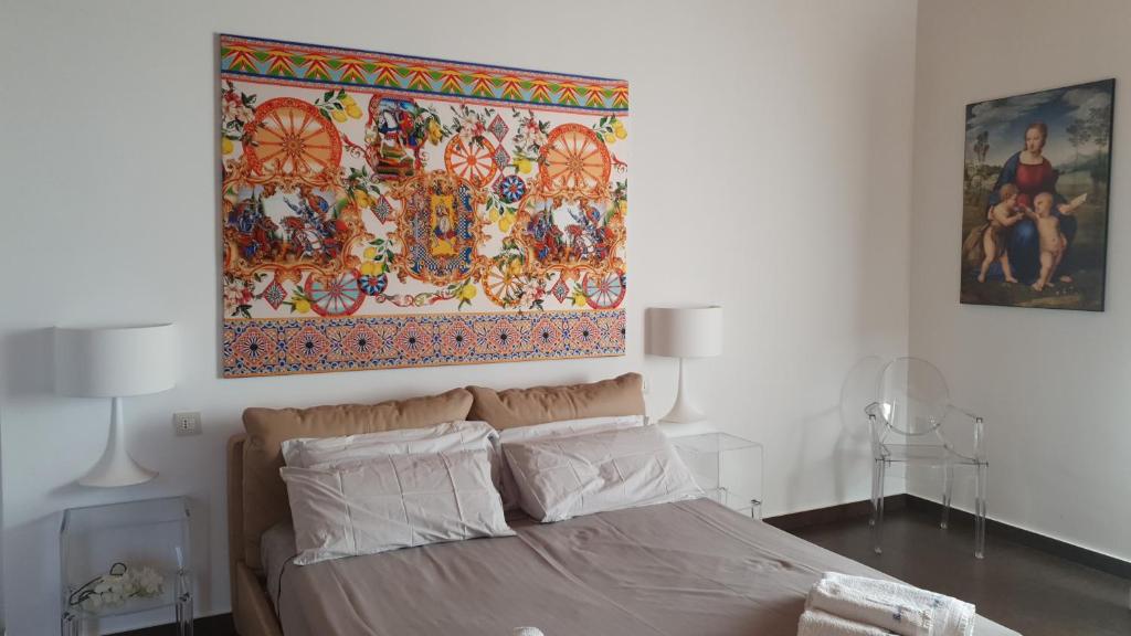 Postel nebo postele na pokoji v ubytování Borgo Ginuga