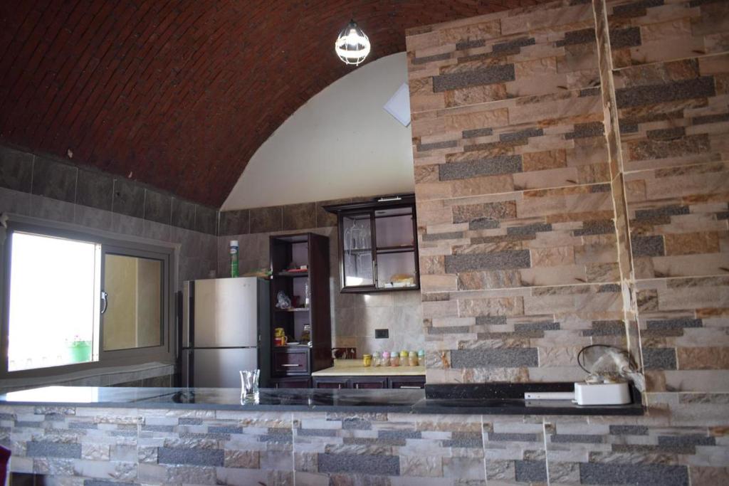 Virtuvė arba virtuvėlė apgyvendinimo įstaigoje Kony Nubian Guest House