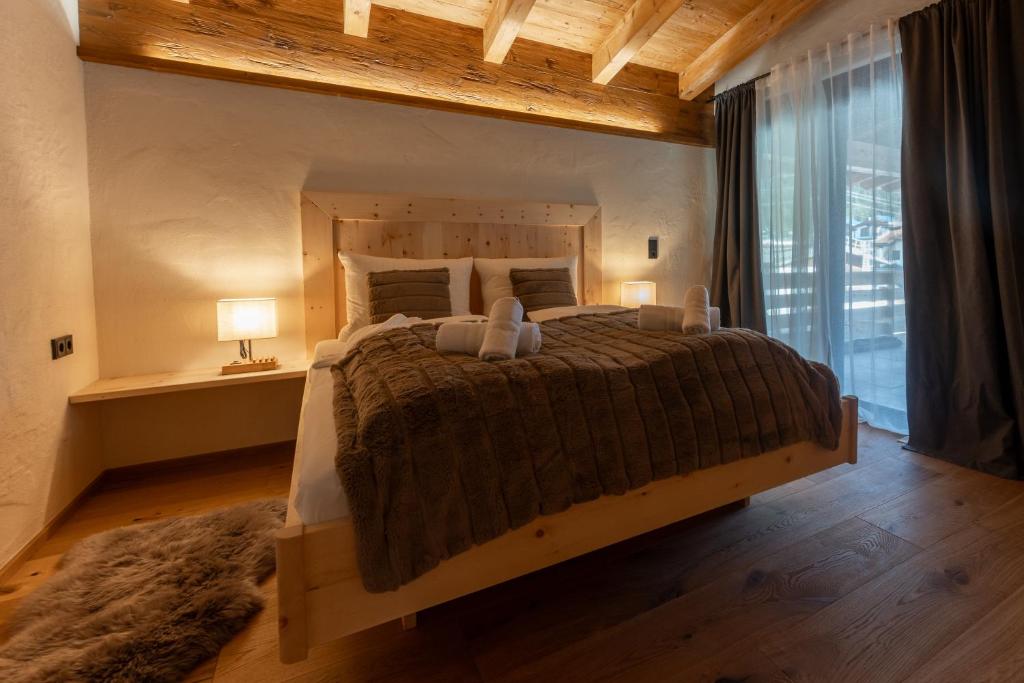Postel nebo postele na pokoji v ubytování Alprocks Alvaresort