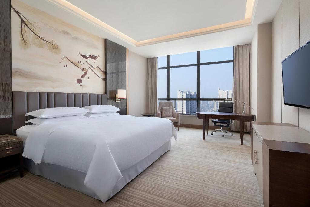 Postel nebo postele na pokoji v ubytování Sheraton Chuzhou Hotel