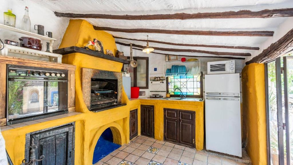 Kuchyň nebo kuchyňský kout v ubytování Casa Marrojo Loja by Ruralidays