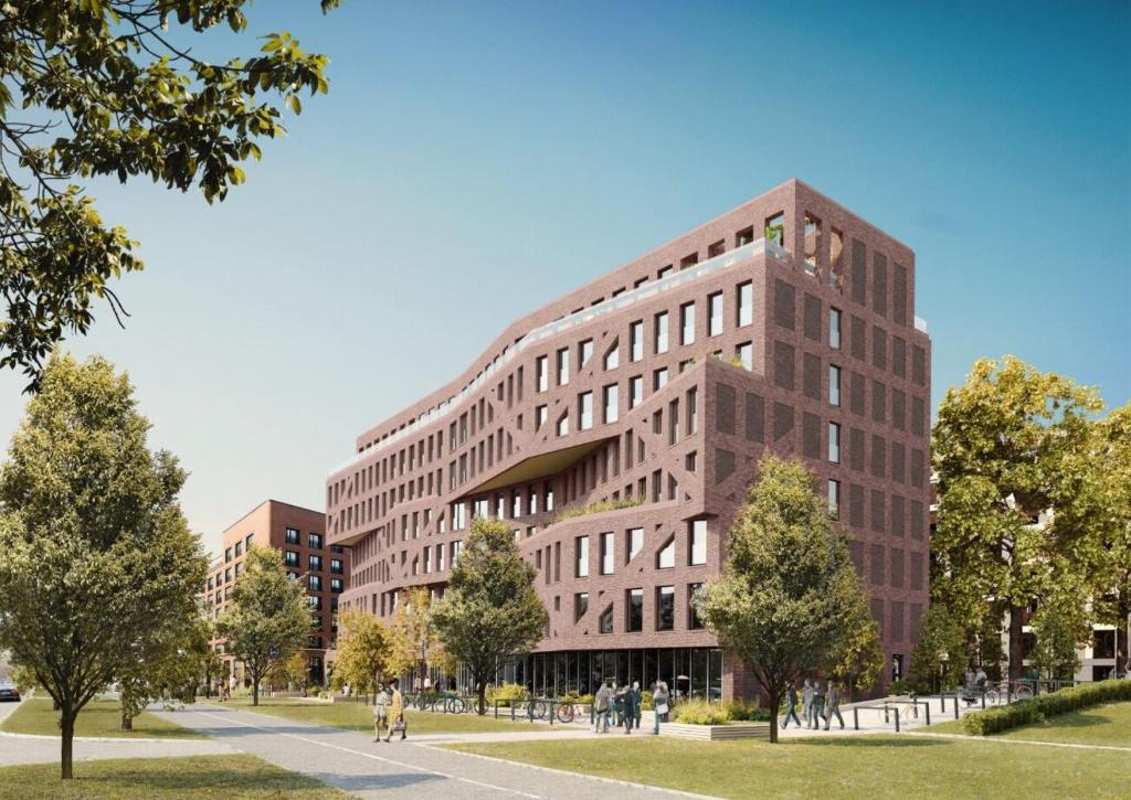 a rendering of a large brick building at Rioca Frankfurt Posto 7 in Frankfurt/Main