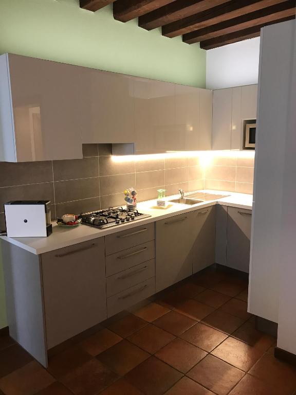 Kuchyň nebo kuchyňský kout v ubytování Residence Montegrappa
