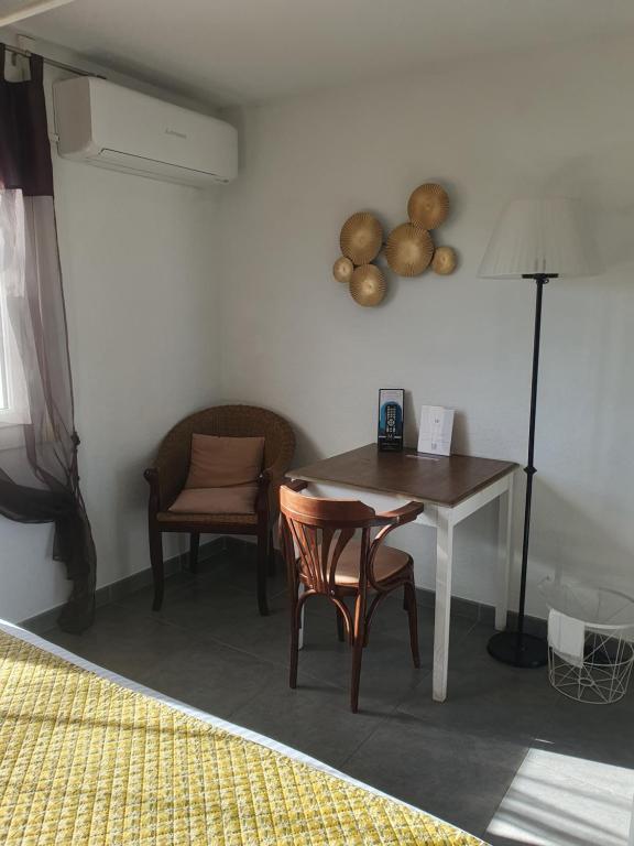 Posezení v ubytování Le Mas des Quintrands Manosque - Motel de charme