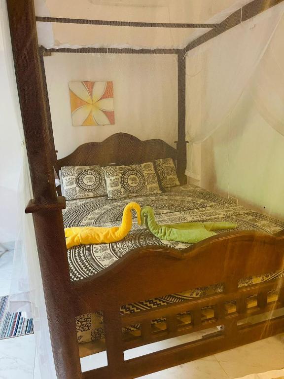 Postel nebo postele na pokoji v ubytování Su Yu villa