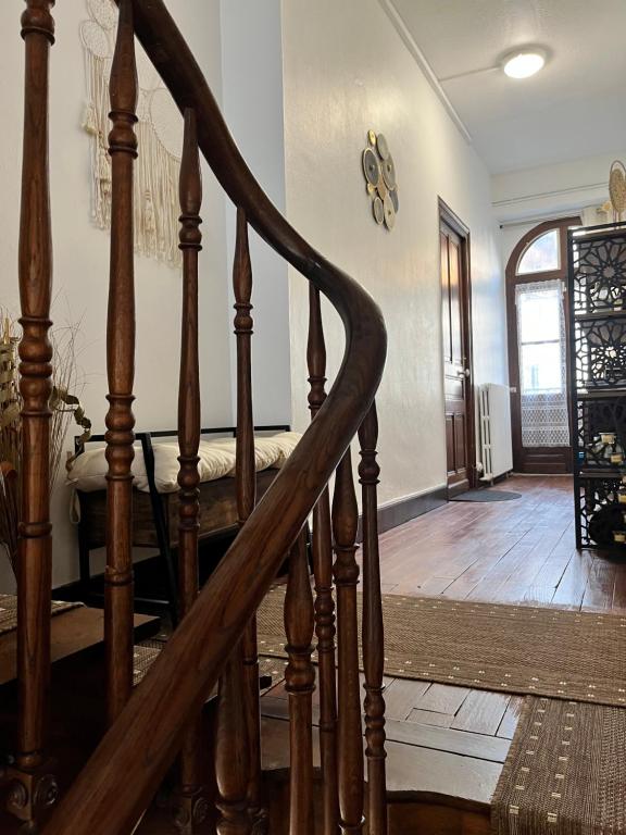 a spiral staircase in a room with a stair case at Villa Julia in Capvern