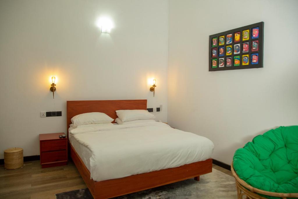 Postel nebo postele na pokoji v ubytování TIKI TAKA