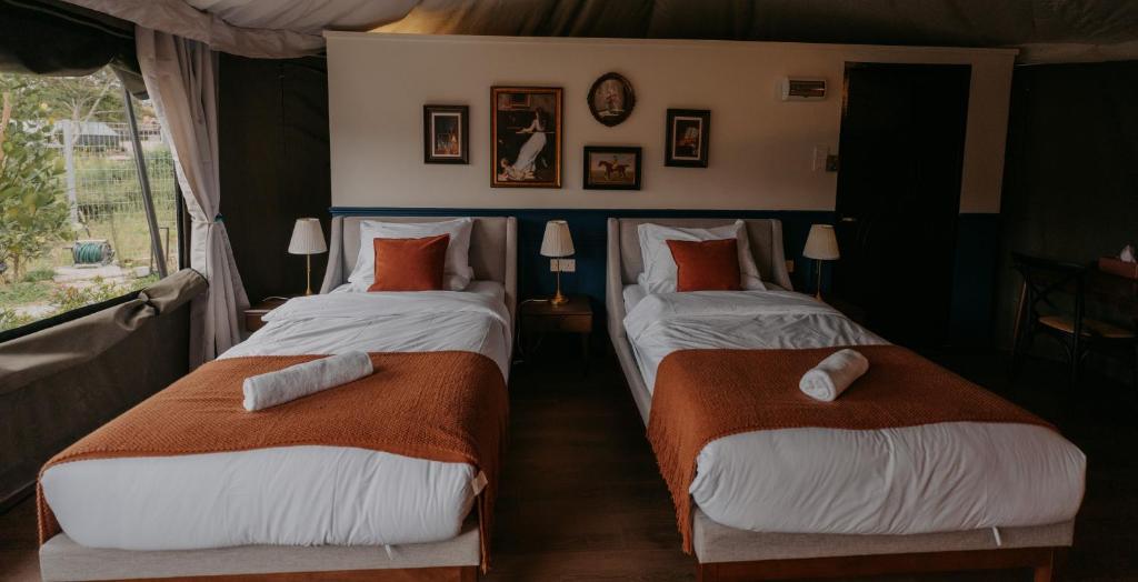 Letto o letti in una camera di kMah@SomerMansion