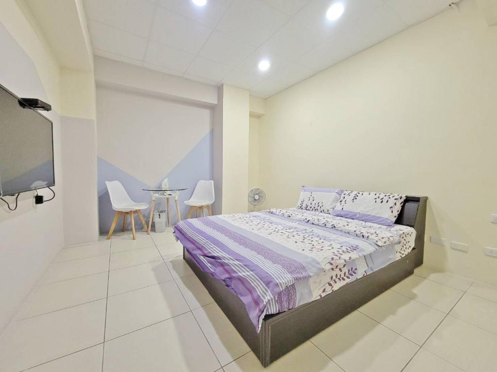 Postel nebo postele na pokoji v ubytování Good Fit Homestay