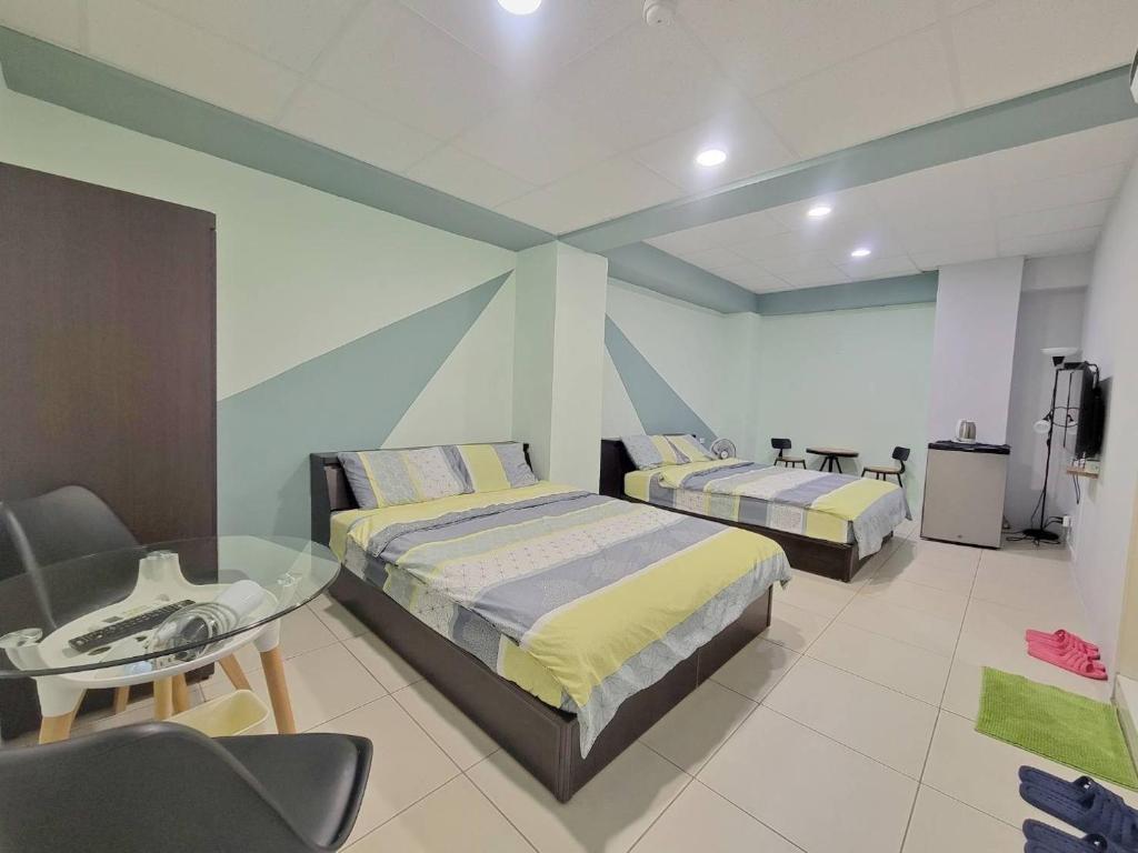 Postel nebo postele na pokoji v ubytování Good Fit Homestay