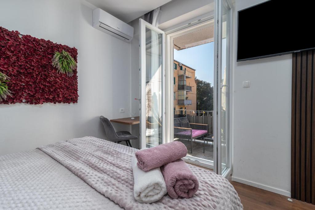 Postel nebo postele na pokoji v ubytování Antares Luxury Rooms