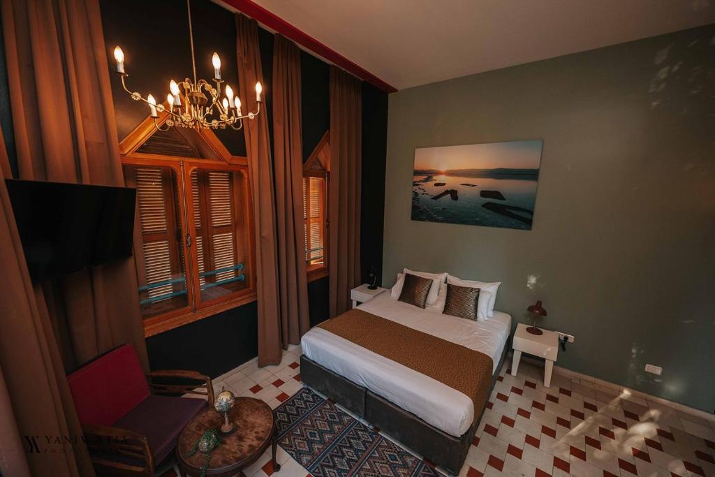 Postel nebo postele na pokoji v ubytování INTA Hotel