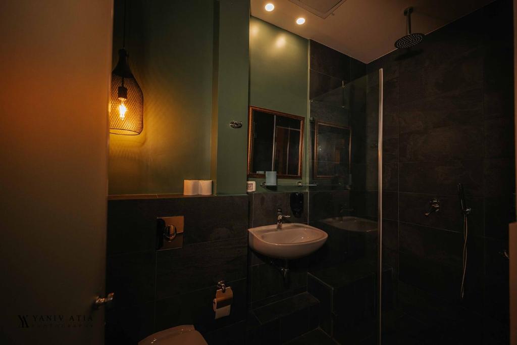 Koupelna v ubytování INTA Hotel