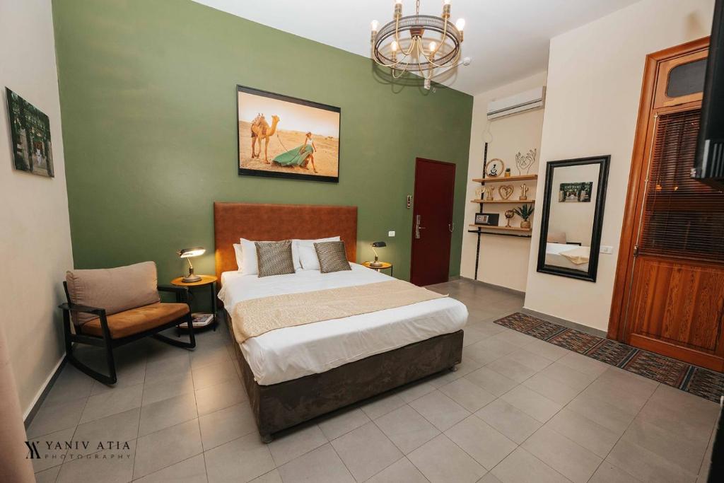 Postel nebo postele na pokoji v ubytování INTA Hotel
