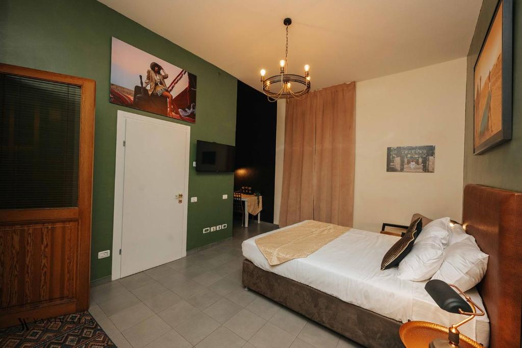 Postel nebo postele na pokoji v ubytování INTA Hotel