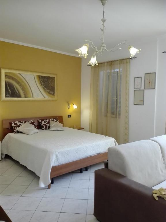 Postel nebo postele na pokoji v ubytování B&B Peschici Rooms