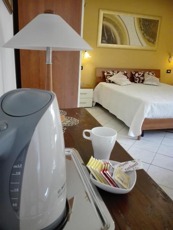 Postel nebo postele na pokoji v ubytování B&B Peschici Rooms