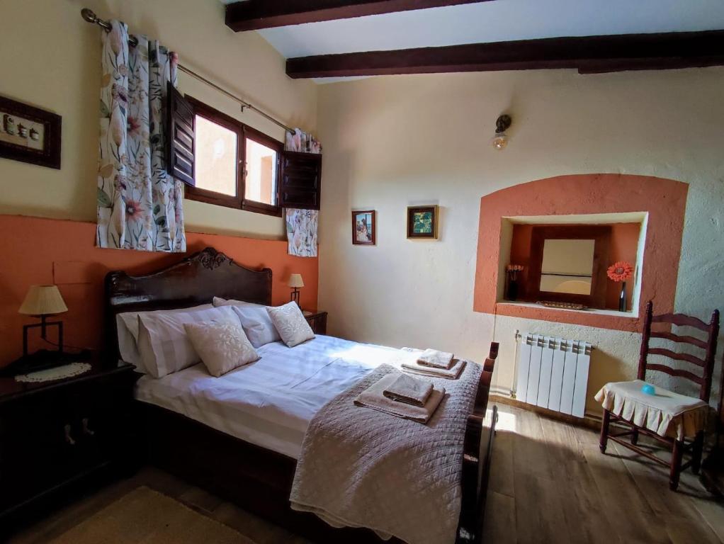 Postel nebo postele na pokoji v ubytování Casa la Coma