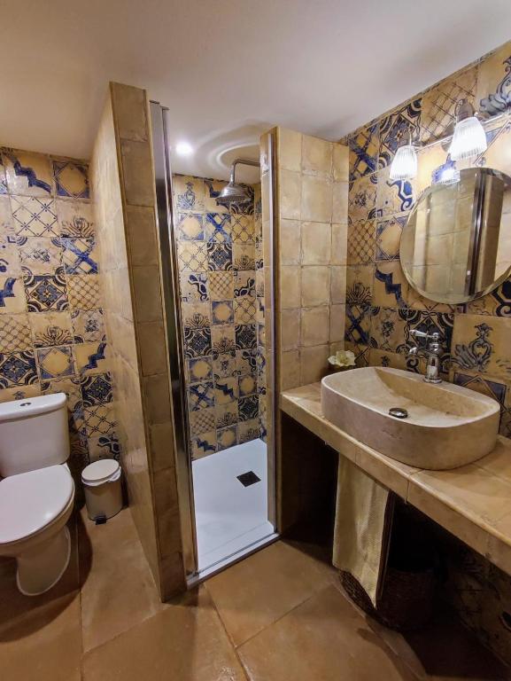 Koupelna v ubytování Casa la Coma