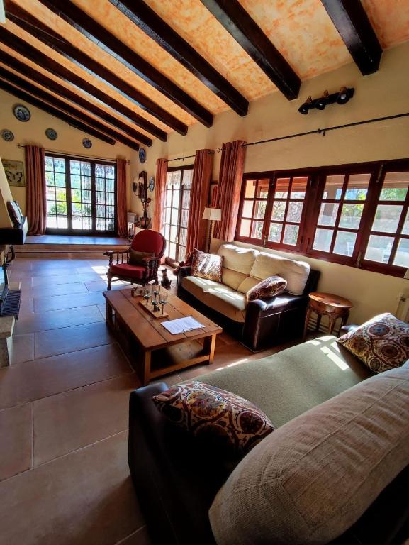 Posezení v ubytování Casa la Coma