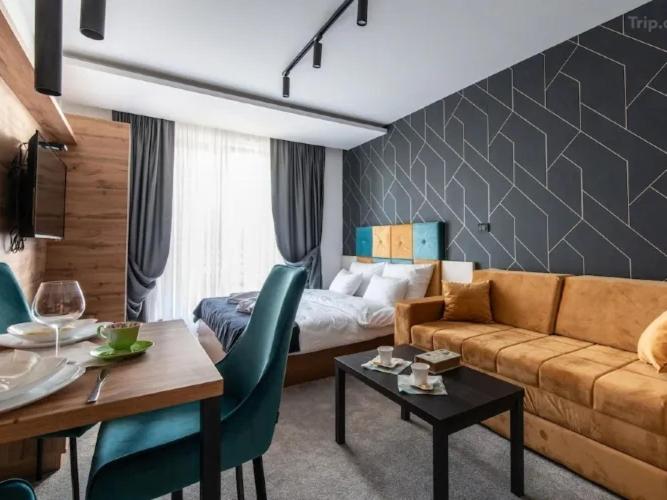 Posezení v ubytování Lux studio Andrej A43 Hotel Djina