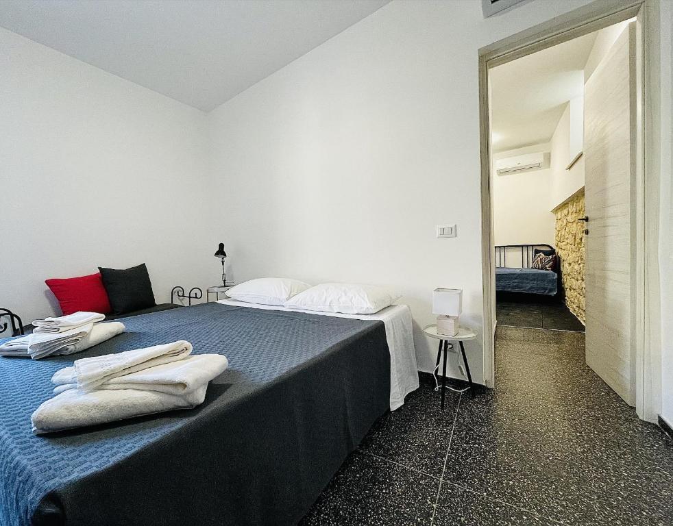 Postel nebo postele na pokoji v ubytování Casa Scribano