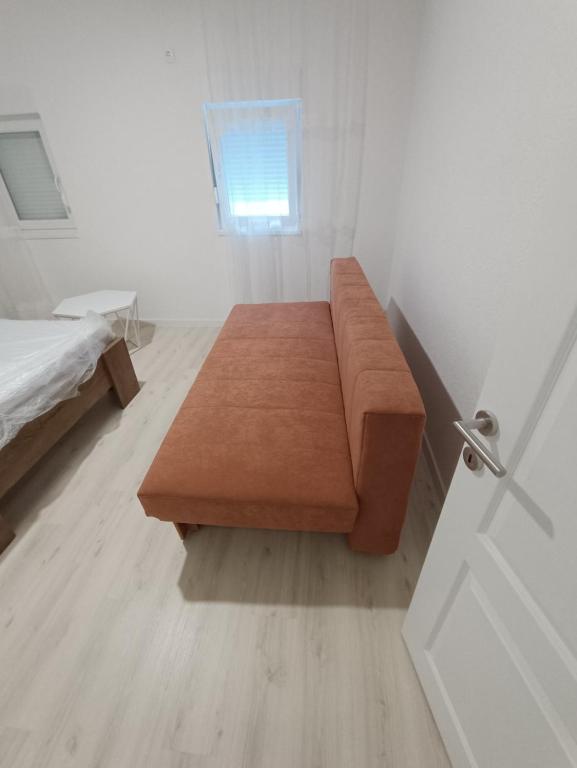 Postel nebo postele na pokoji v ubytování Apartments Daris