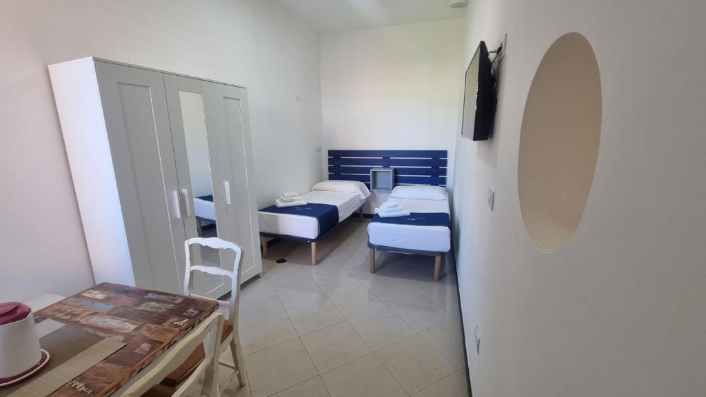 Postel nebo postele na pokoji v ubytování Sorrento Coast Relais